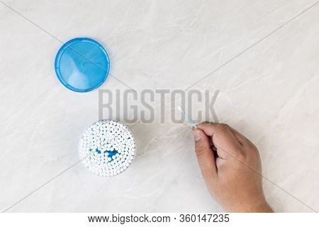Ear Swab Package With Male Hand Holding Ear Swab With Copy Space