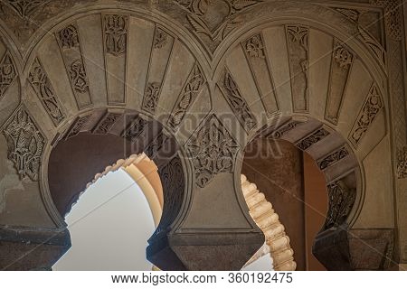 Arch Details Islamic Motifs And Columns In Moorish Architecture In Alcazaba Fortess Malaga Spain.