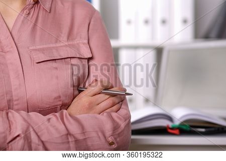 Close-up Of Hand Of Female Chief Executive Officer. Businesslady Discussing Stipulation Of Contract 