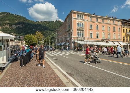 Como, Italy - August 4, 2019: Local People And Tourists On A Quiet Cozy Streets In The Center Of Bea
