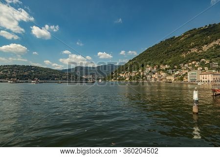 Como, Italy - August 4, 2019: Apartments, Villas, Hotels On The Green Forested Mountainsides Near La