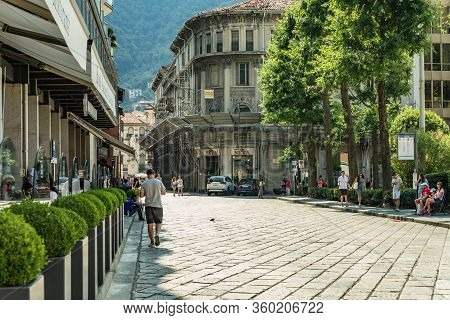 Como, Italy - August 4, 2019: Local People And Tourists On A Quiet Cozy Streets In The Center Of Bea
