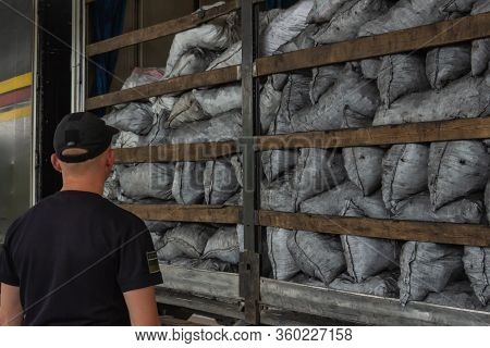 Krakovets, Ukraine - August, 2019: The Border Guard In Special Uniforms Inspects A Truck With Charco