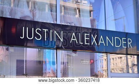 Warsaw, Poland. 8 April 2020. Sign Justin Aleksander. Company Signboard Justin Aleksander.