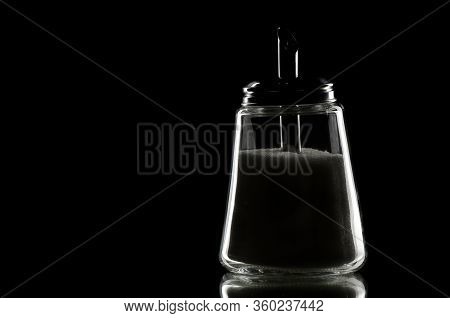 Sugar-basin On The Black Background