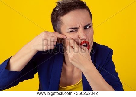 Closeup Portrait Frustrated Young Business Woman Has Find Problems With The Skin, Squeezing A Pimple