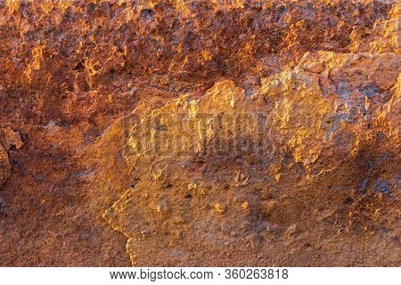 Heavily Rusted And Corroded Metal Sheet In An Industrial Area, Suitable As A Background, Pattern And