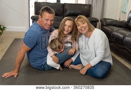 Covid-19 Pandemic - Lockdown. Stay At Home, Save Lives. Caucasian Family Together In Isolation Havin