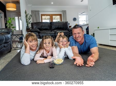 Covid-19 Stay At Home, Save Lives. Family In Staying Home Happy To Stop The Coronavirus Spreading.