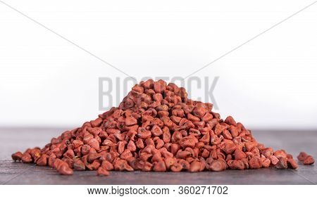 Organic Achiote Seeds - Bixa Orellana. White Background