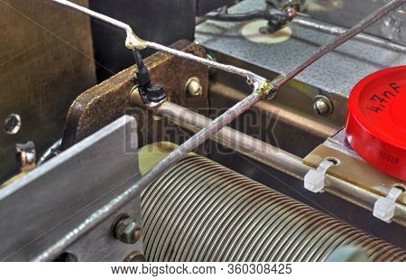 Inside View Of High Frequency Power Amplifier With Capacitors, Coils And Other Components