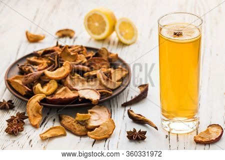 Dried Fruits Drink With Lemon On A Wooden Background. Uzvar Could Be Drunk Cold Or Hot.