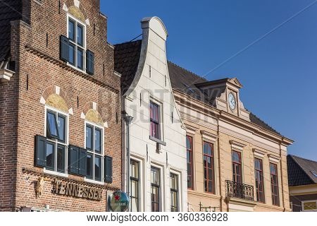 Steenwijk, Netherlands - March 27, 2020: Facades Of Historic Buildings At The Market Square Of Steen