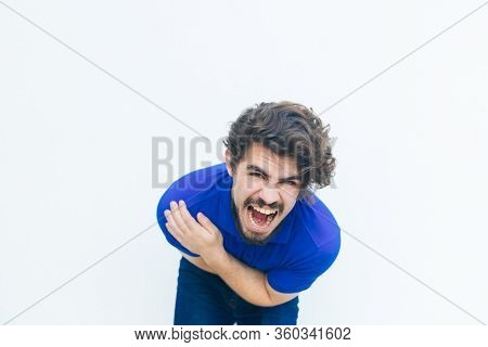 Frustrated Unhappy Guy Screaming With Pain, Holding Stomach, Bending. Handsome Bearded Young Man In 