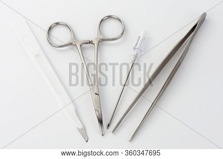 Close Up Of Medical Instruments On White Background. Instruments  Is Used For Cannulation Of Central