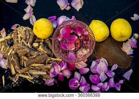Close Up Face Mask Of Age-old Herb Mulethi For Radiant Skin On A Black Surface Consisting Of Some Le