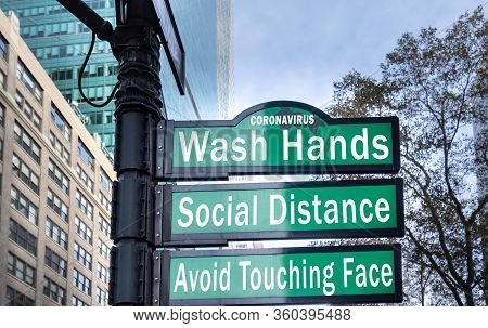 Corner Street Sign In New York City With The Basic Ruloes To Avoid Coronavirus