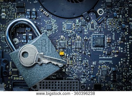 Data Protecting Security Concept. Computer Internet Protection With Lock, Key On Microscheme Chip. S