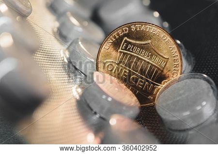One Cent Cent Coin On A Pack Of Pills