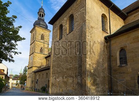 View Of Ancient St. James (jakobskirche) Church On Empty Street Of Bamberg Medieval Town , Bavaria, 