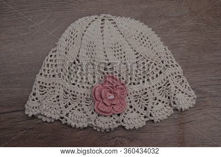 Kids Bege Hand Made Beautiful Hat In Wood Table