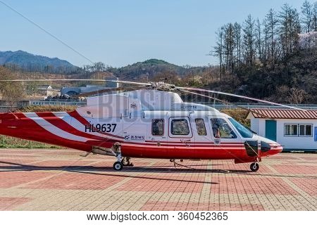 Hwanggan, South Korea; April 8, 2020: Starboard Side View Of Sikorsky S76c+ Helicopter Parked On Hel
