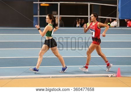 Istanbul, Turkey - March 07, 2020: Athletes Race Walking During International U18 Indoor Athletic Ma