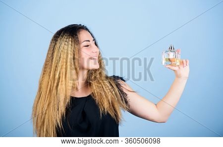 Be Yourself. Pretty Woman Hold Perfume. Elegant Smell. Cosmetic Care. Woman With Bottle Of Perfume. 