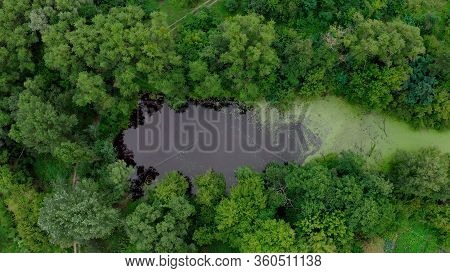 Top View Of A Mysterious Scary Lake, A Strange Place With Unusual Energy