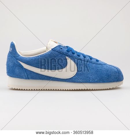 Vienna, Austria - August 16, 2017: Nike Classic Cortez Km Qs Blue And White Sneaker On White Backgro