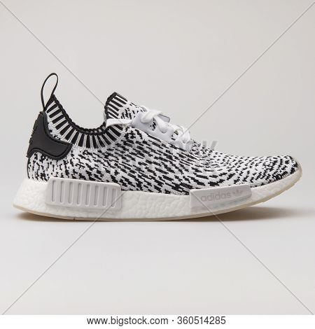 Vienna, Austria - August 16, 2017: Adidas Nmd R1 Pk White And Black Sneaker On White Background.