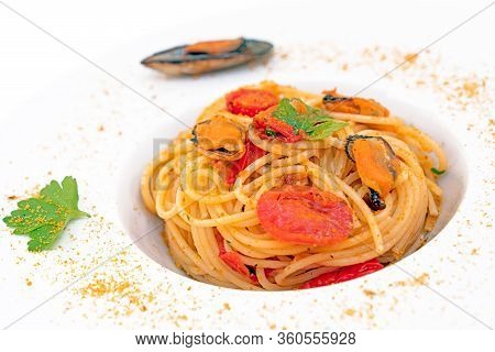 Spaghetti With Mussels Bottarga Fish And Cherry Tomatoes