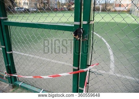 Play Ground Area - Soccer Field - Closed Due To Corona Virus With Warning Sign In German Language