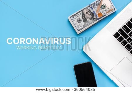 The Concept Of Working From Home During A Coronavirus Epidemic. People Work Remotely. Laptop And Ban
