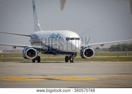 Otopeni, Romania - April 9, 2020: Blue Air Airplane On Henri Coanda International Airport.
