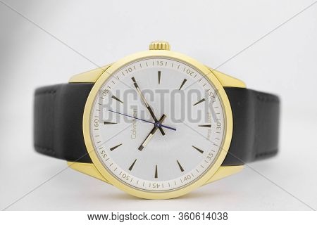 Biel, Switzerland 31.03.2020 - The Closeup Of Calvin Klein Man Gold Pvd Coating White Clock Face Dia