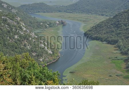 Rijeka Crnojevića, Part Of The Skadar Lake In Montenegro. Tourist Cruises By Boat On The Beautiful M