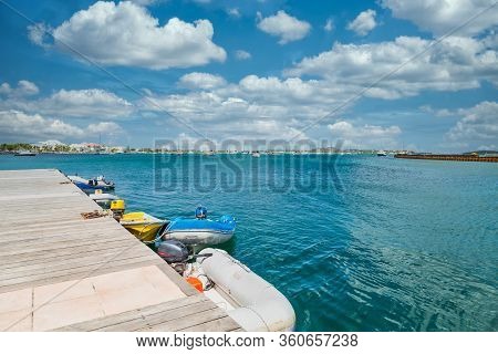 Small Boats Along A Pier In Marigot, St. Martin