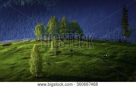Green Hills During Spring Or Summer. Beautiful Mountain View At Sunset Or Sunrise