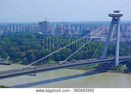 Bratislava Skyline And Snp Bridge Over Danube River, Known As Ufo Bridge