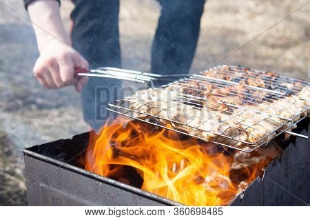 Chicken Wings On Grill, Man Cooking Chicken