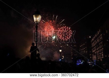 Fireworks And People By Night Sky In Italy Tuscany San Ranieri