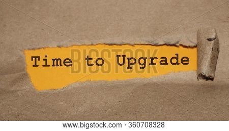 Time To Upgrade Written Under Torn Paper. Innovation Update In Busness Startup Concept