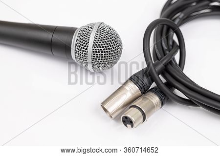 Vocal Microphone With Xlr Mic Cable Isolated Above White Background