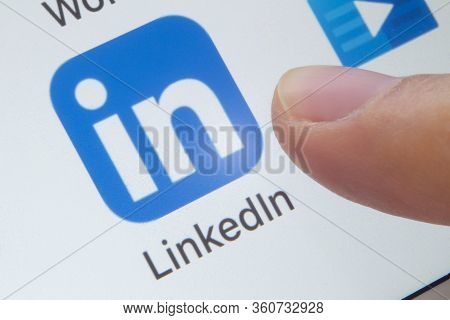 Calgary, Alberta. Canada. April 11, 2020. A Person About To Open The Linkedin Application On A White