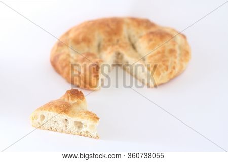 Slices Of Ramadan Pita (ramazan Pidesi) Traditional Turkish Bread For Holy Month Ramadan On White Ba