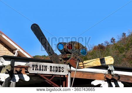 Dual Blade, Antique Train Signal Has Three Different Colored Lights, Red, Yellow And Blue.