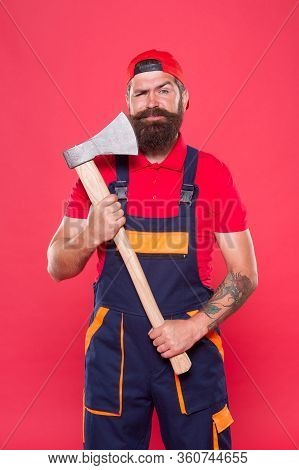 Man With Axe. Forester Hold The Ax. Man In Uniform Cut Beard Hair With Ax. Brutal Bearded Man Use Ax
