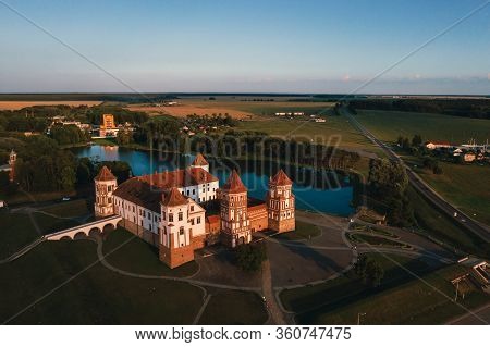 Mir Castle With Spires Near The Lake Top View In Belarus Near The City Of Mir