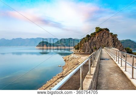 Mini James Bond Style Island At Dusk Under Colourful Sky In Plover Cove, Hong Kong